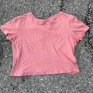 Pink crop top.